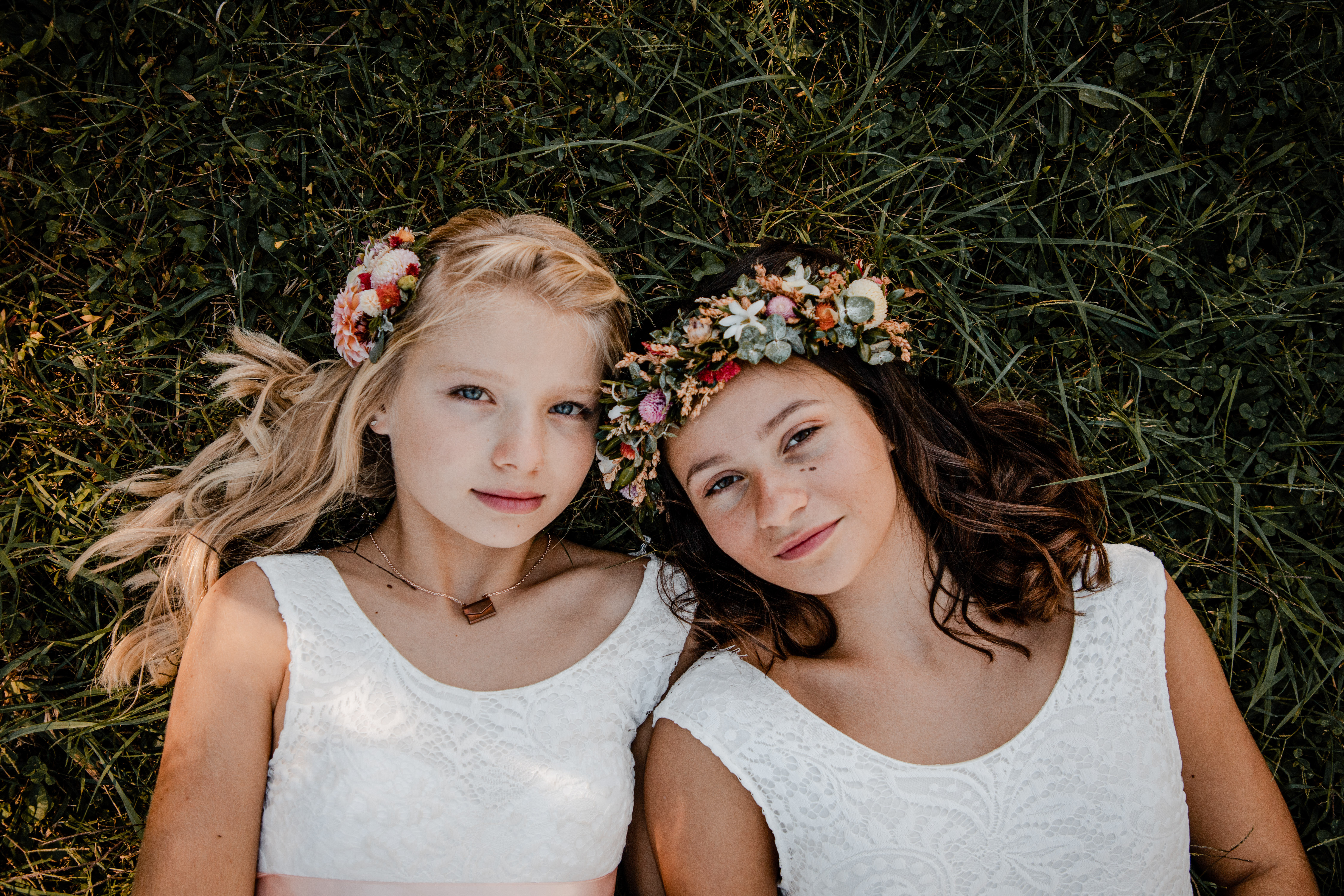Image of two best friends with floral crowns. Shows that styled shoots can be something other than weddings.